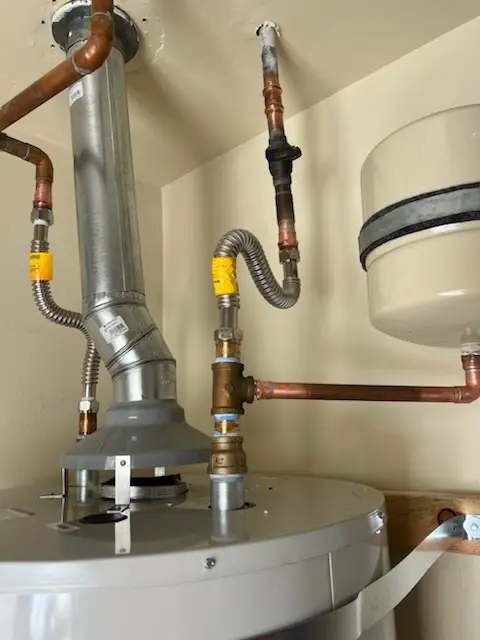 Water heater installation and plumbing repair in En'Core